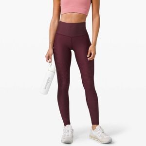 Lululemon Mapped Out High Rise Tight 28" *Camo
Color: Cassis / Smoky Red Size: 8